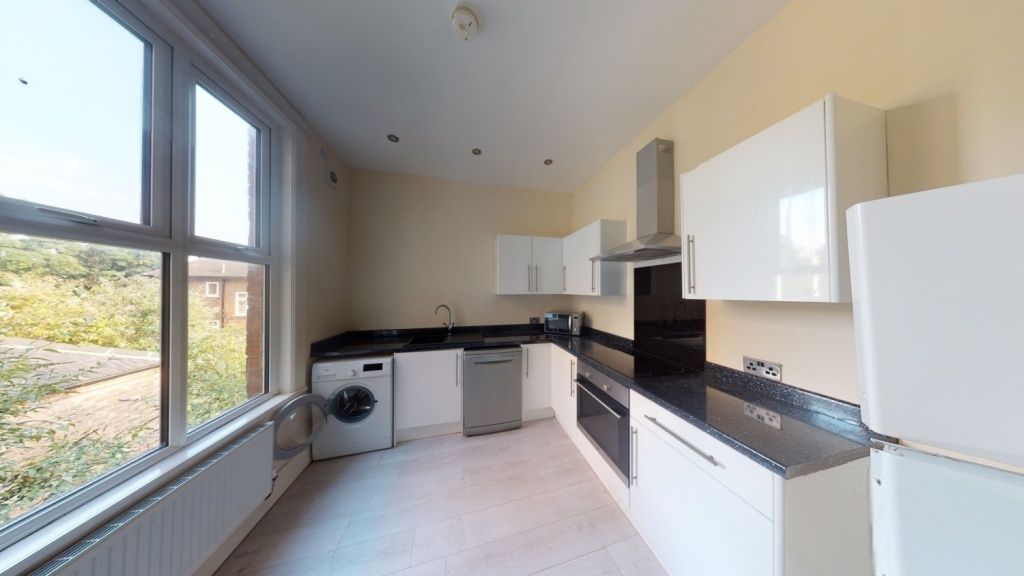 Property photo 1 of 5 Bright And Modern Kitchen Featuring Ample Natural ...