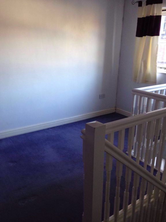Property photo 3 of 8 Balcony Bedroom