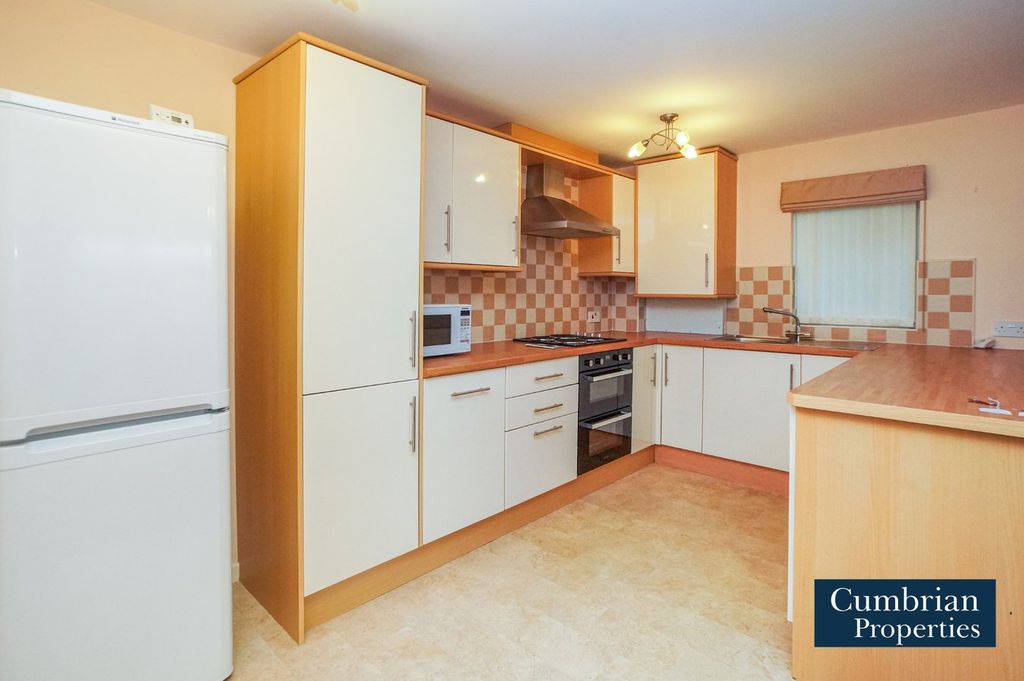 Property photo 2 of 14 Kitchen Area