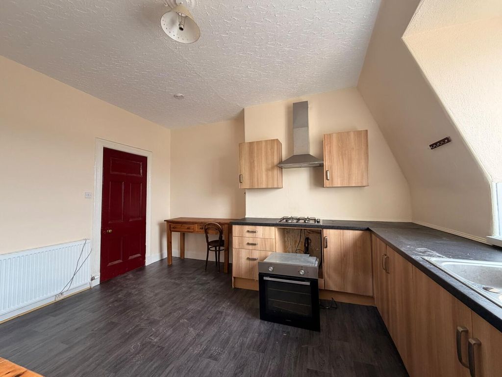 Property photo 2 of 8 Kitchen