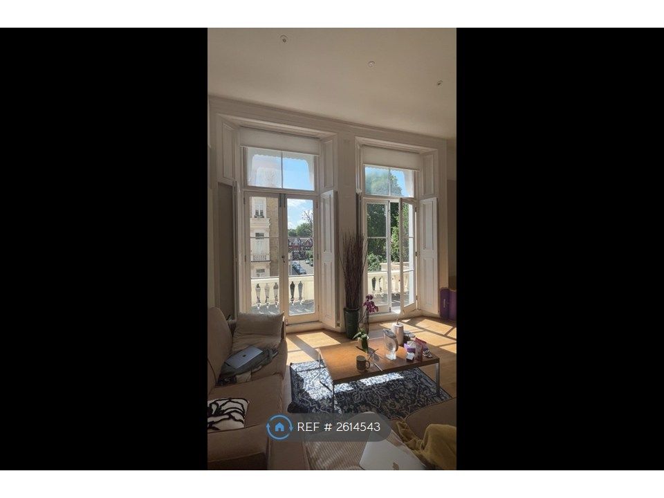 Property photo 2 of 8 Living Room + Dinning Room With Balcony Access