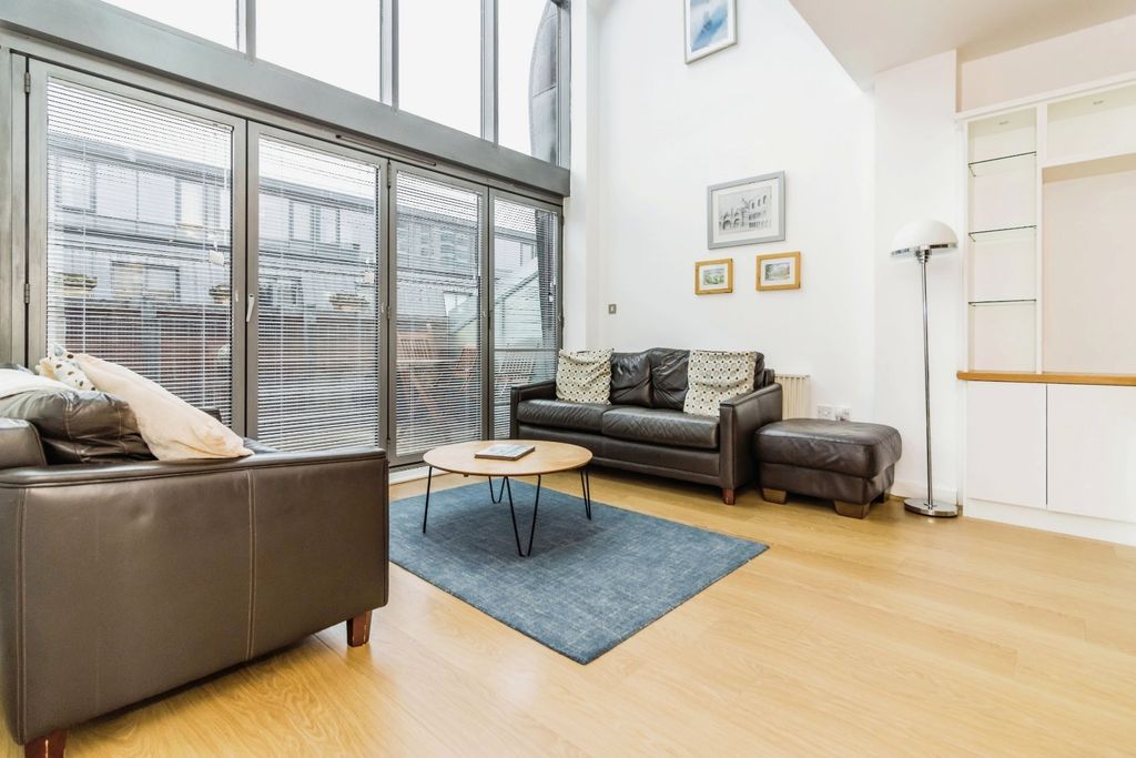 Property photo 1 of 12 Living Area