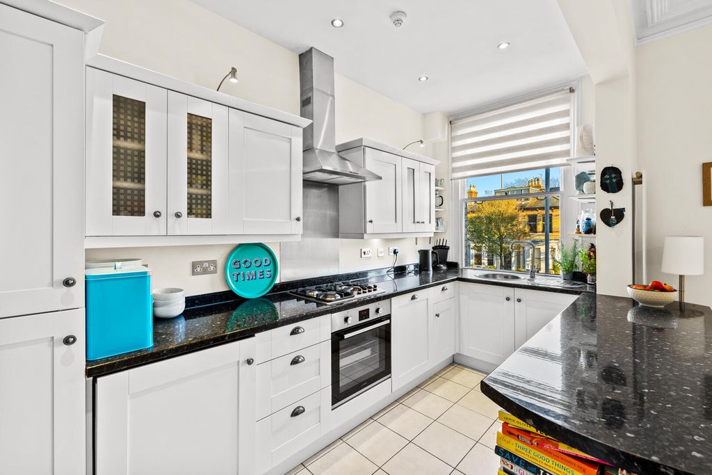 Property photo 3 of 12 Kitchen