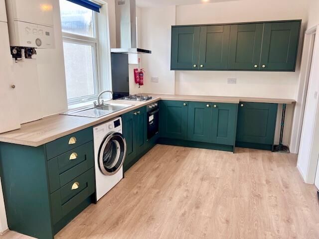 Property photo 2 of 9 Bright And Modern Kitchen With Deep Green Cabinetr...