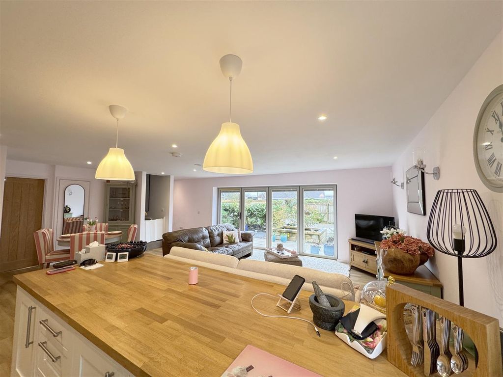 Property photo 2 of 31 Kitchen To Family Room