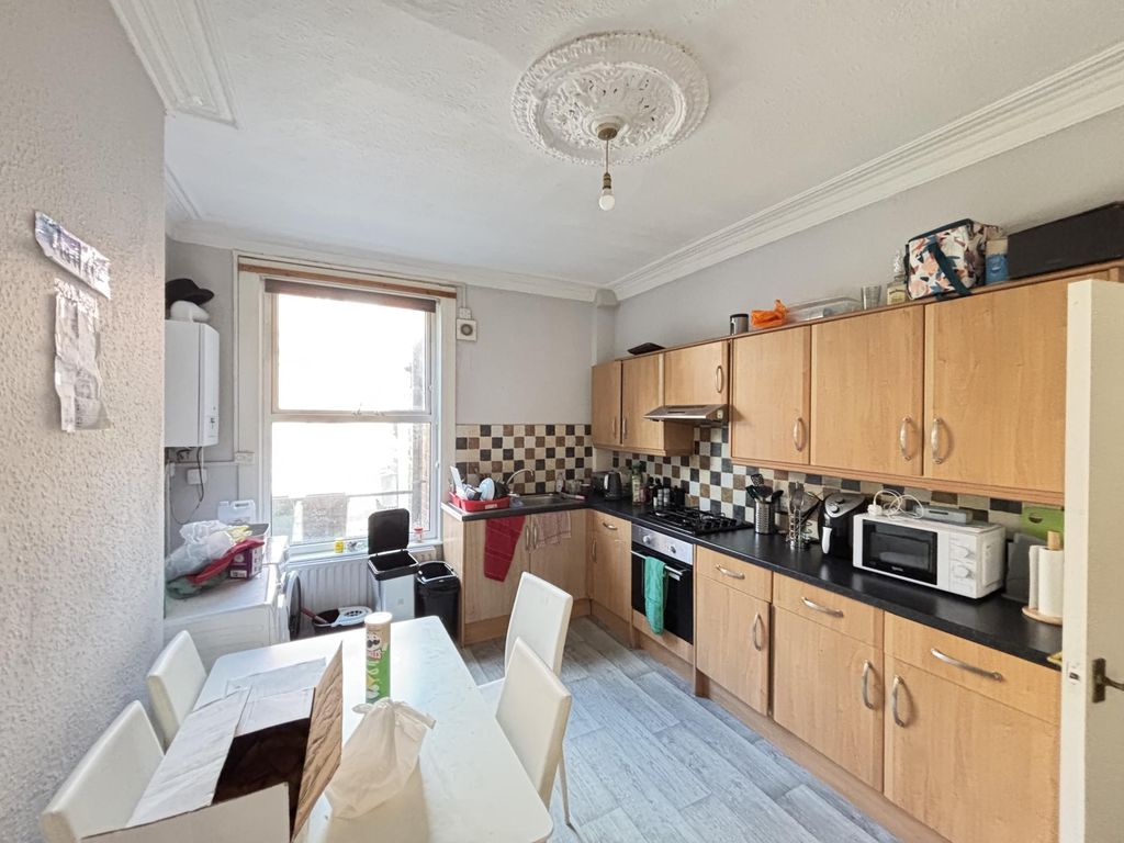 Property photo 3 of 10 A Well-Organized Kitchen With Ample Natural Light,...