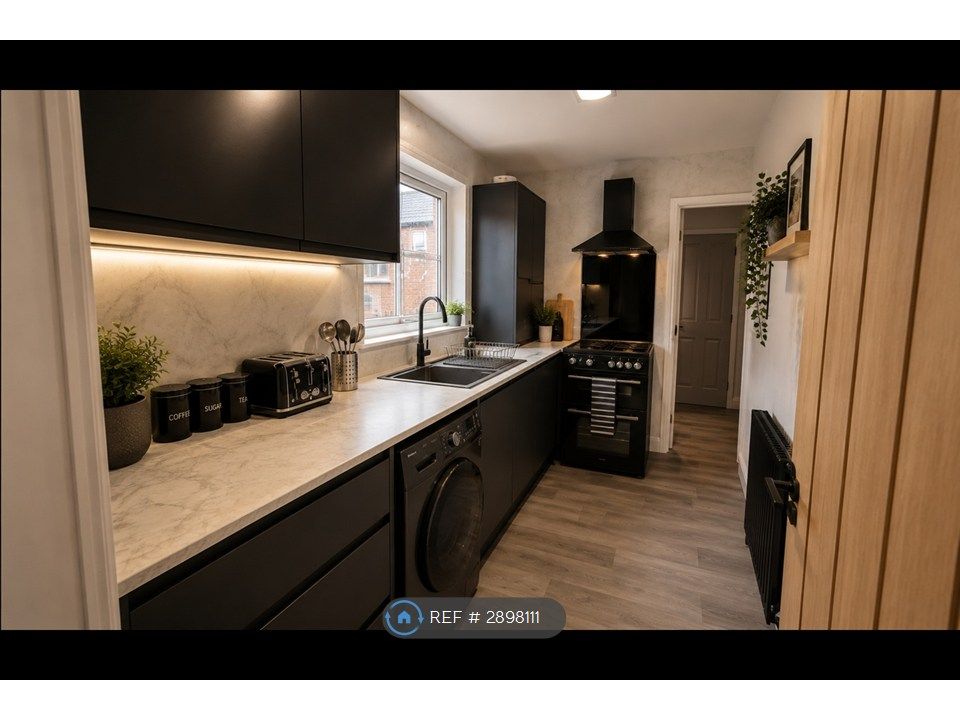 Property photo 3 of 9 Kitchen