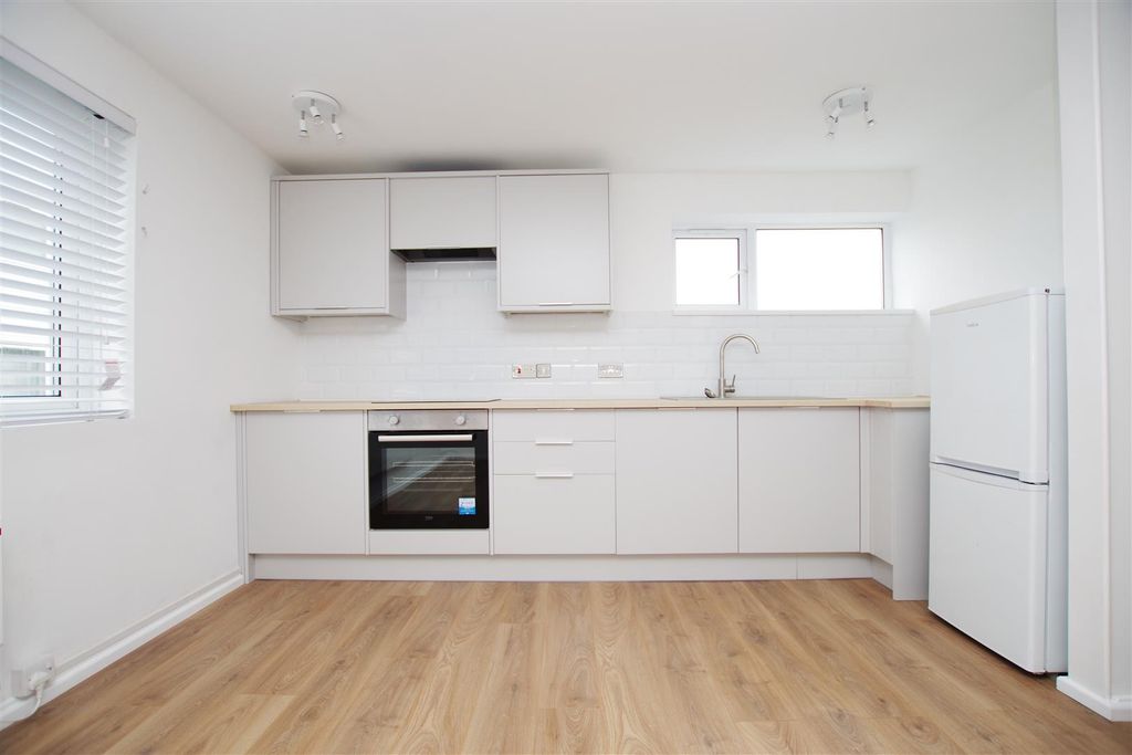 Property photo 3 of 9 Kitchen Area