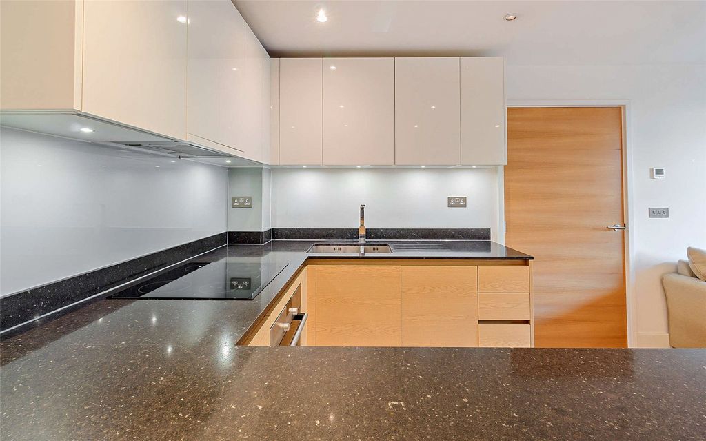 Property photo 2 of 15 Kitchen Area