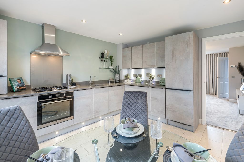 Property photo 2 of 10 Kitchen And Dining Room In Three Bedroom Home