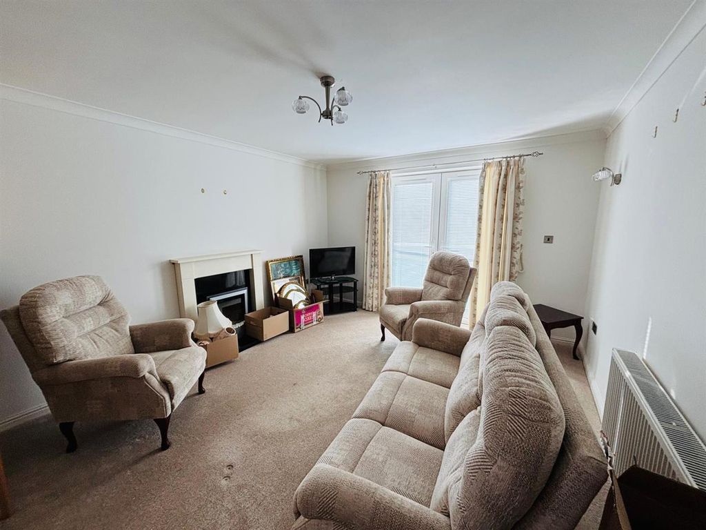 Property photo 2 of 13 Living Room Area: