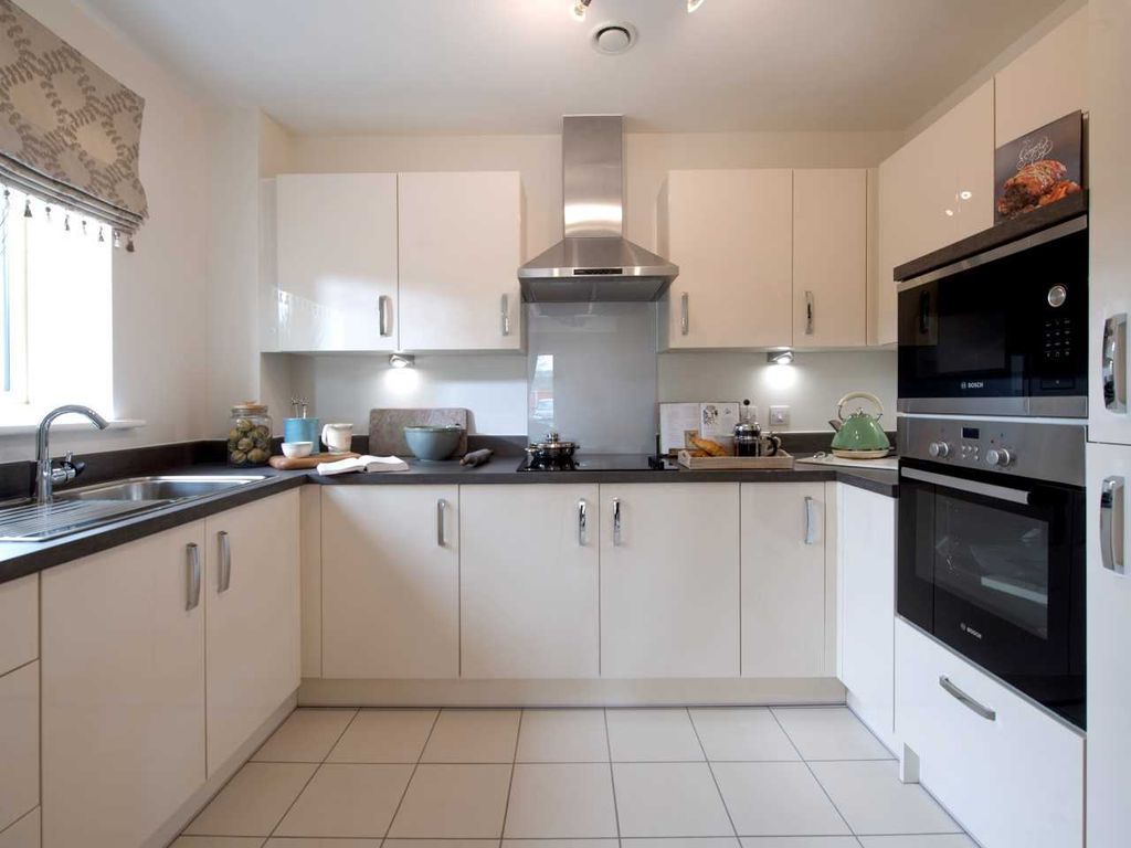 Property photo 3 of 11 Typical Kitchen