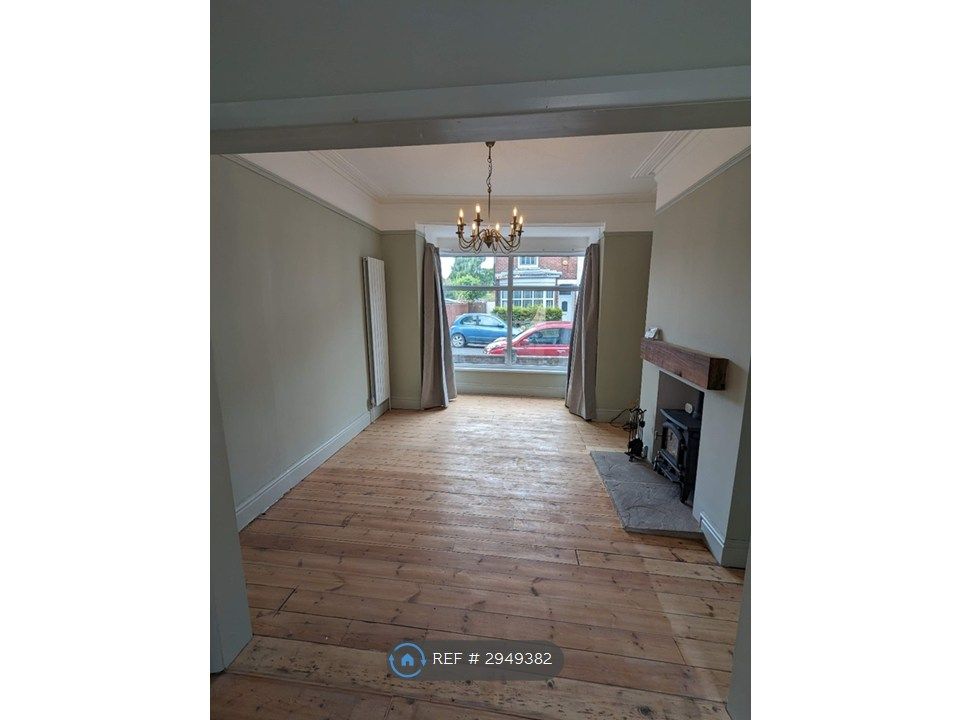 Property photo 3 of 12 Front Living Room