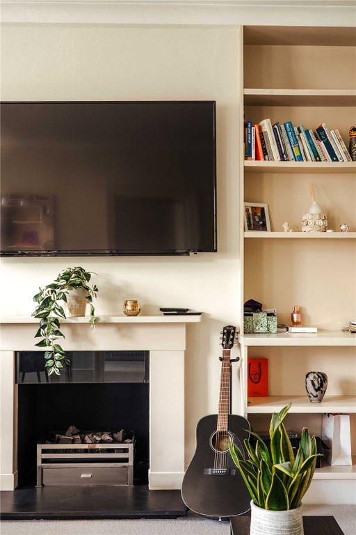 Property photo 3 of 11 Fireplace