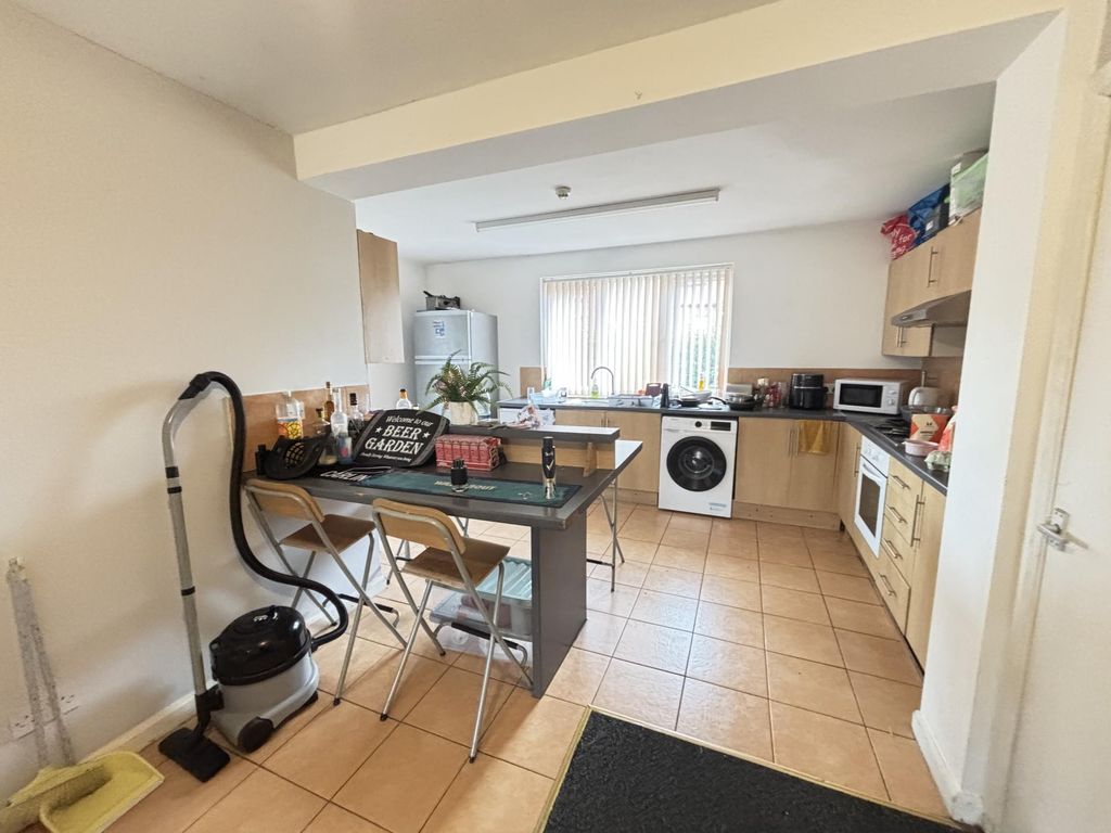 Property photo 2 of 8 A Bright And Functional Kitchen With Ample Natural...