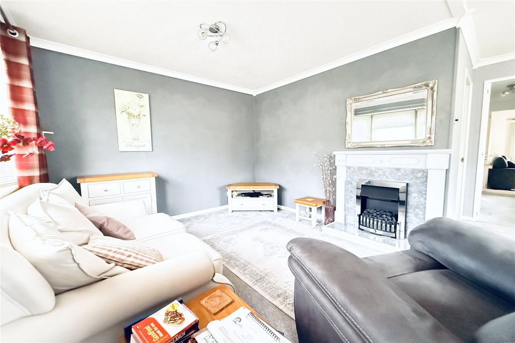 Property photo 3 of 18 Living Area