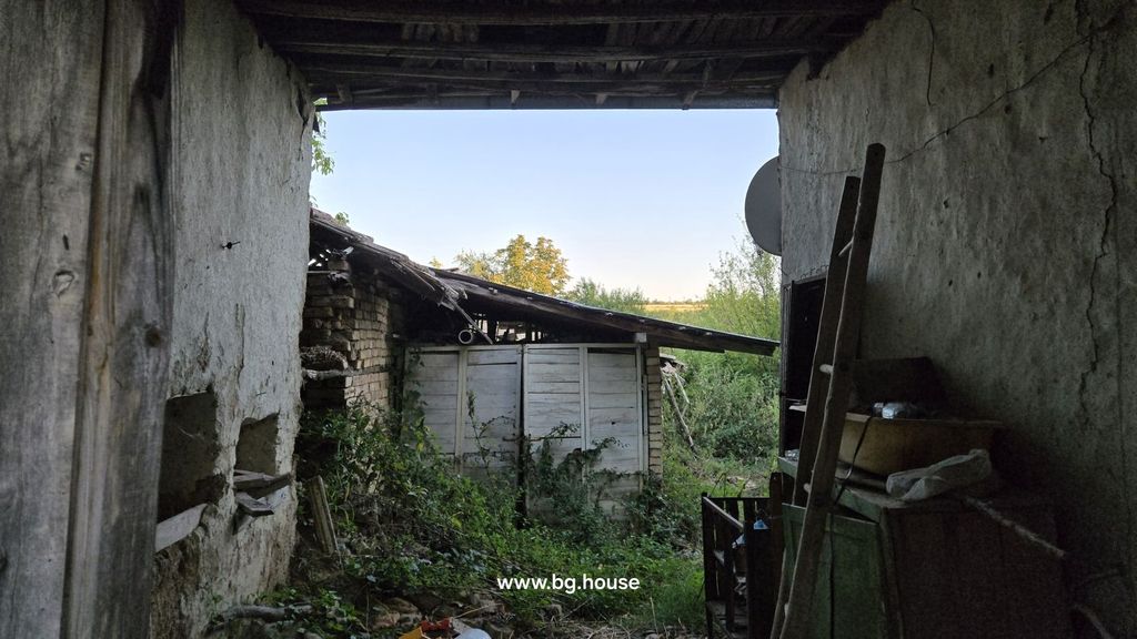 Property photo 3 of 29 View Through A Covered Passageway With Wooden Roof, Showing Garden Area And Outbuildings Beyond.