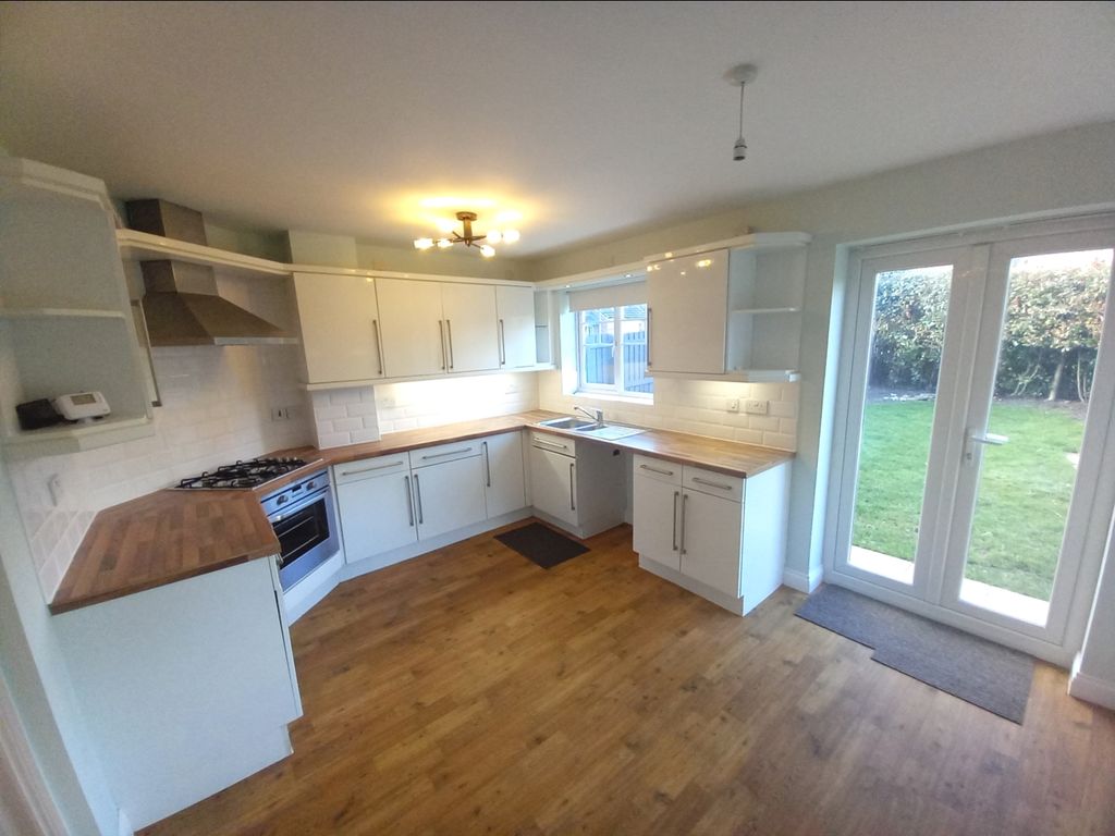 Property photo 3 of 14 Dining Kitchen