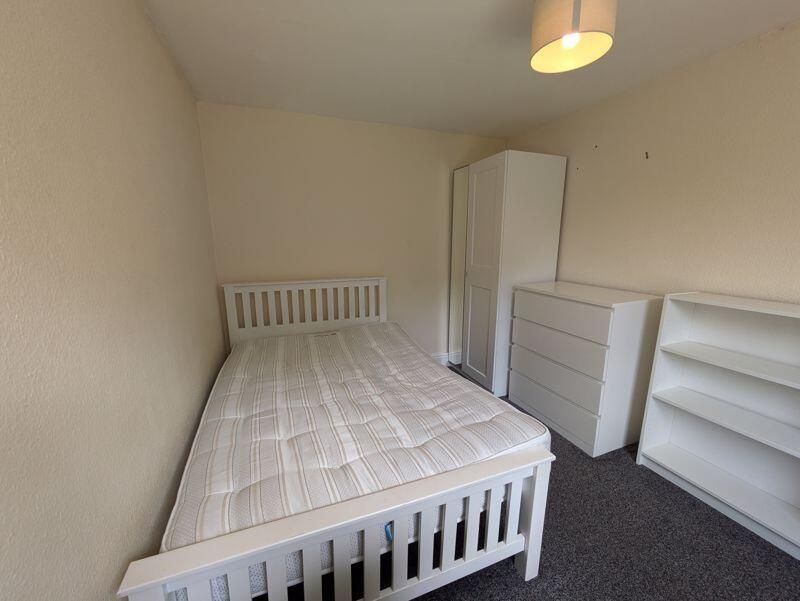 Property photo 1 of 8 A Bright And Inviting Master Bedroom Featuring A c...