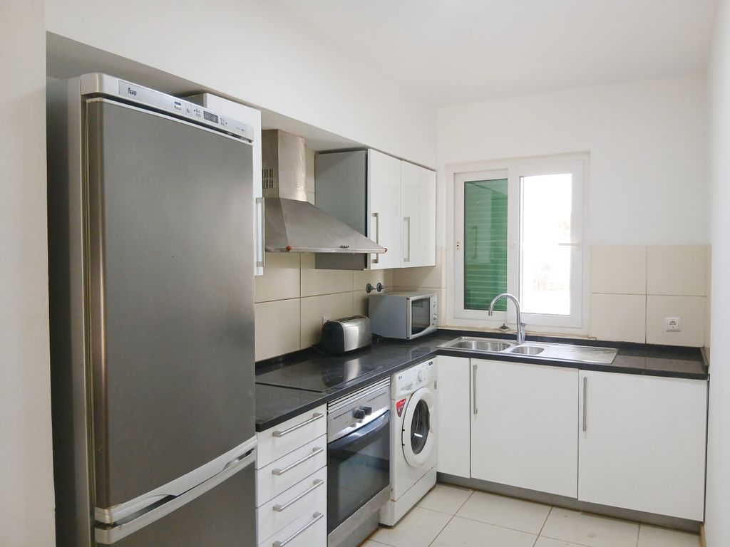 Property photo 3 of 13 Kitchen Area