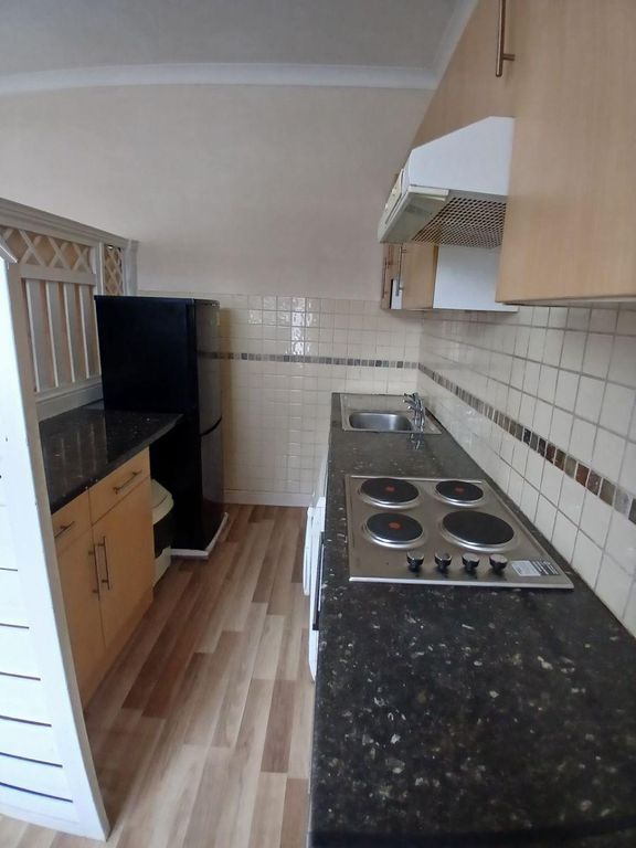 Property photo 1 of 7 Kitchen
