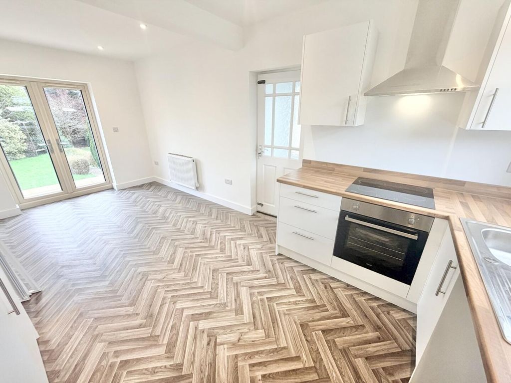 Property photo 3 of 13 Dining Kitchen