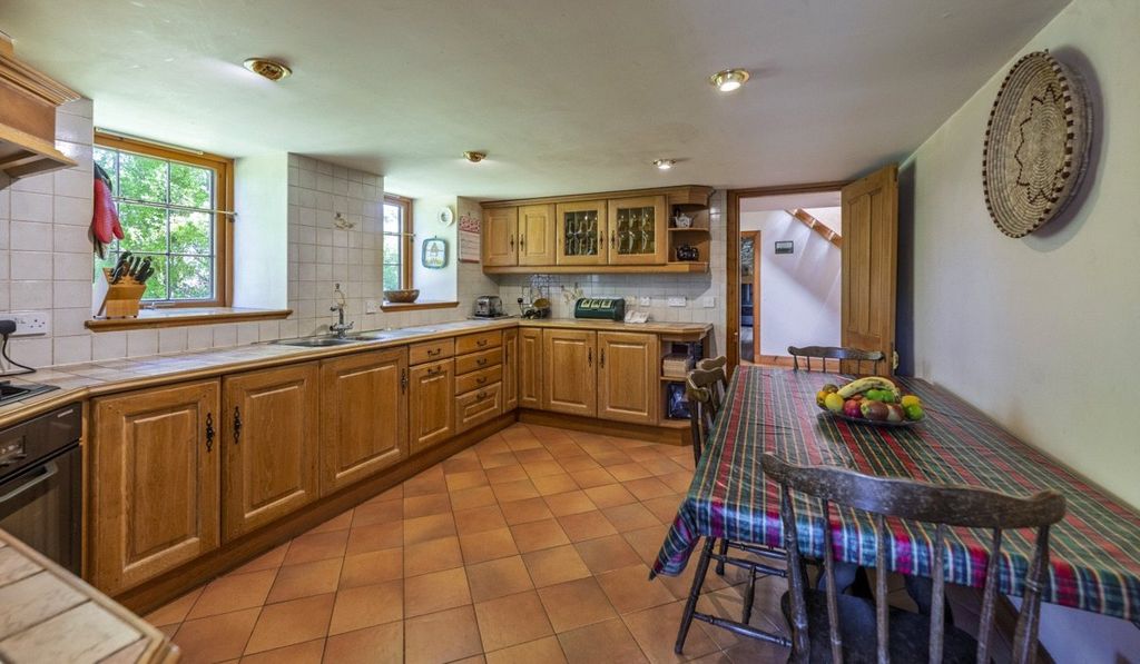 Property photo 3 of 13 Dining Kitchen