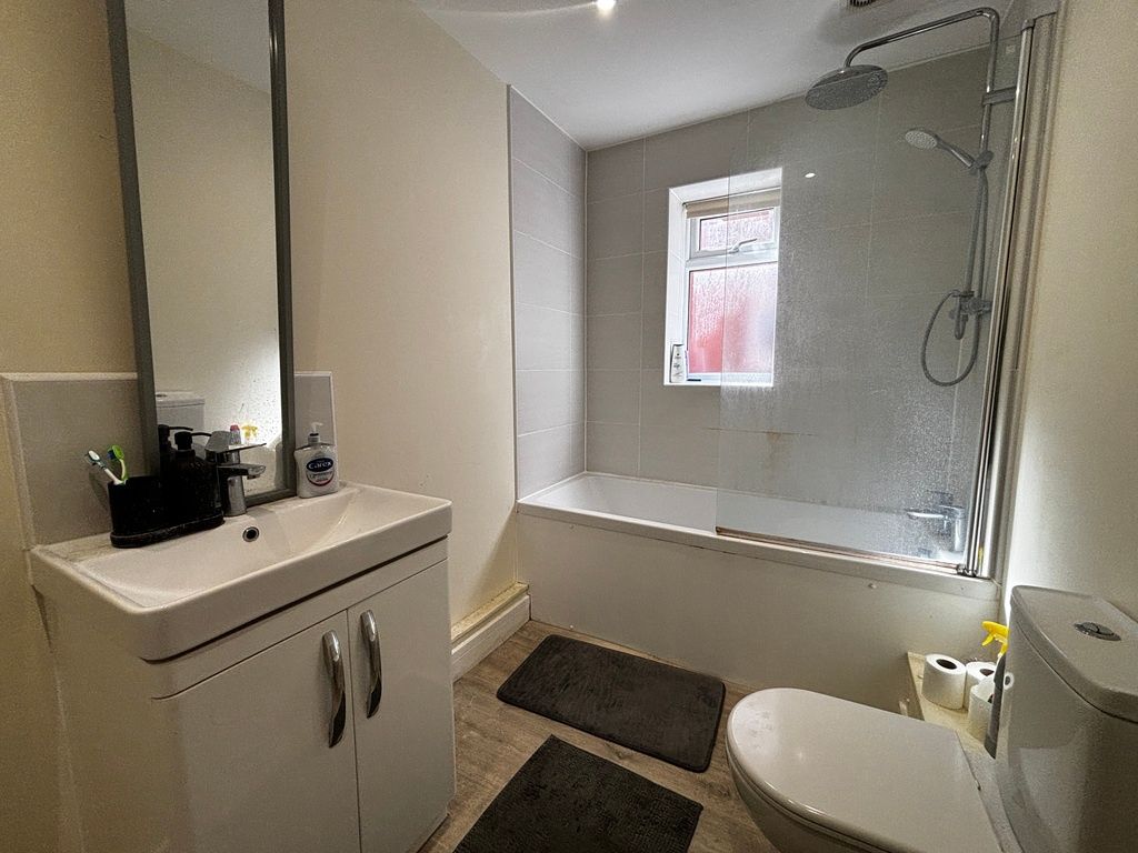 Property photo 1 of 11 Bright Bathroom With Modern Vanity And Full Tub...
