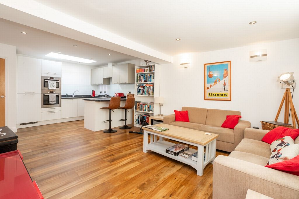 Property photo 3 of 15 Kitchen/Dining/Living Space