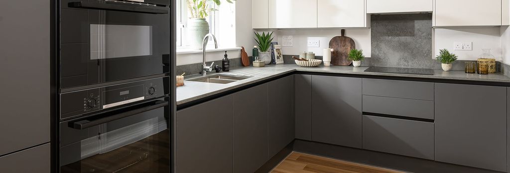 Property photo 2 of 5 Eastbrook Village Home, Spacious Kitchen With A Dark Grey Design