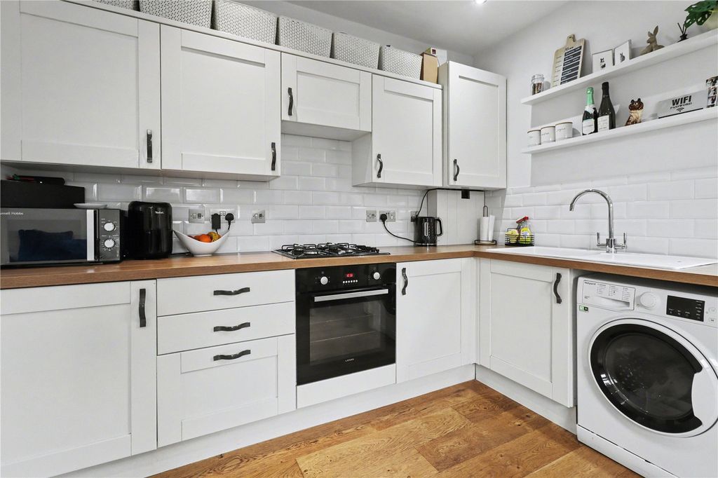 Property photo 2 of 12 Kitchen Area