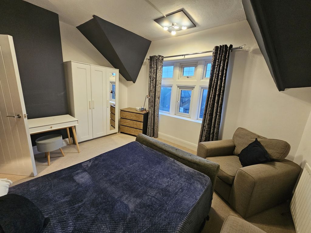 Property photo 1 of 21 A Spacious Master Bedroom Featuring A Comfortable ...