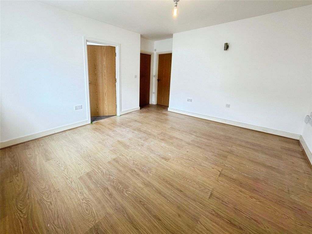 Property photo 3 of 12 Living Area
