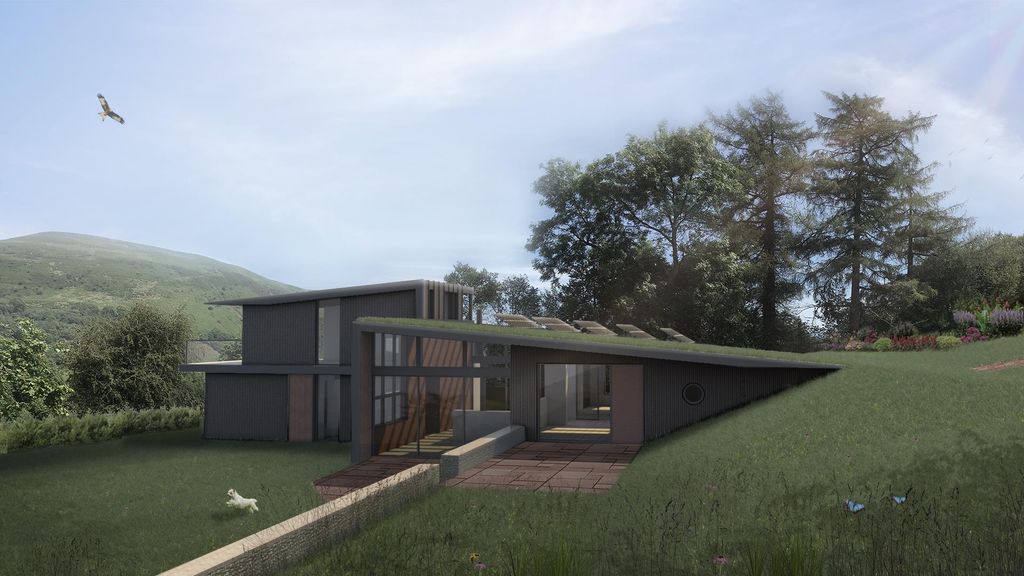 Property photo 1 of 2 Tin House Exterior .Jpg