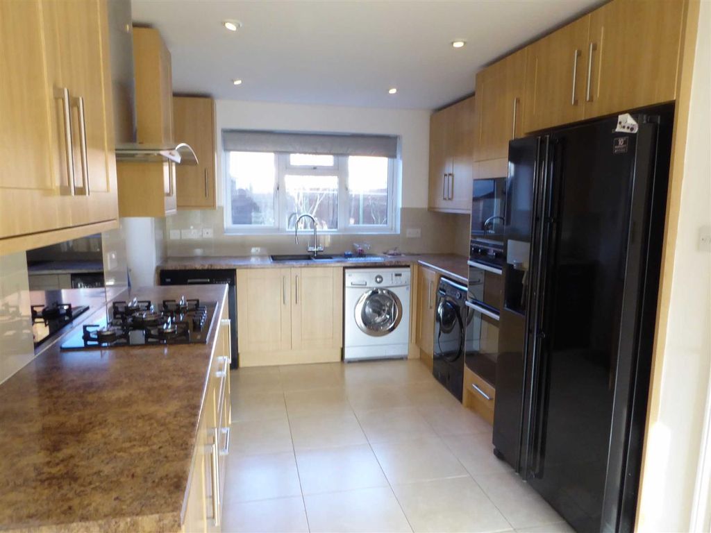 Property photo 2 of 19 Kitchen Family Room