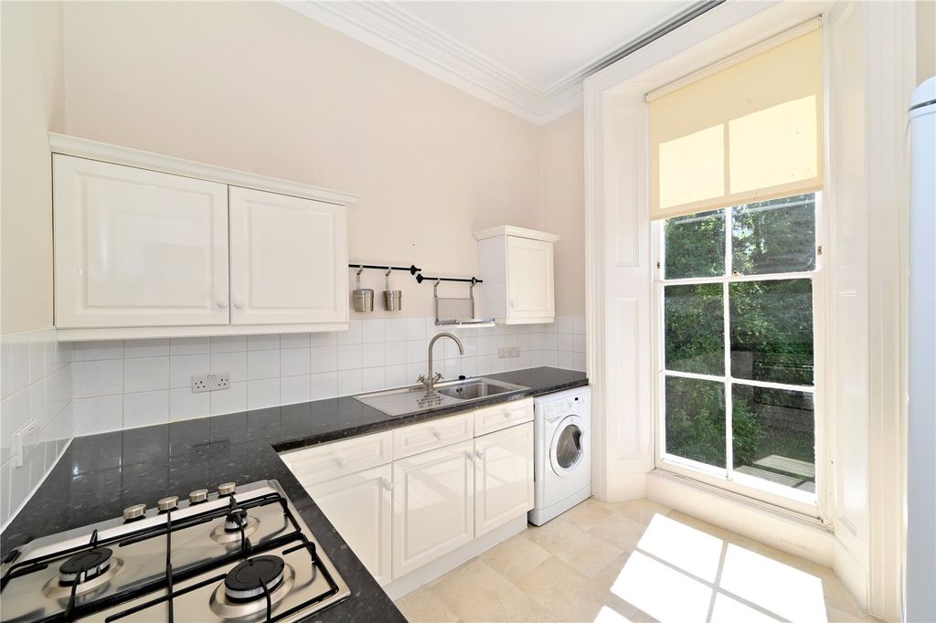 Property photo 3 of 7 Kitchen