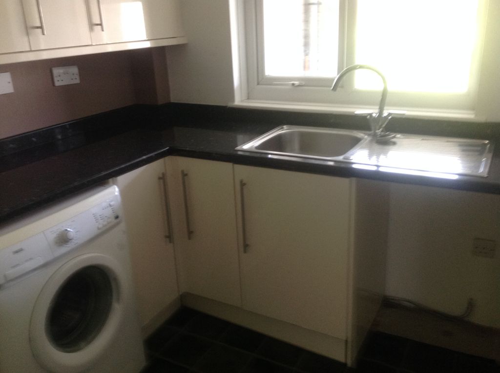 Property photo 2 of 9 Kitchen