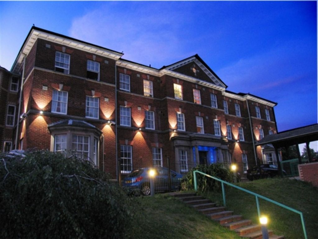 Property photo 1 of 6 Exterior At Night (11) (Large).Jpg