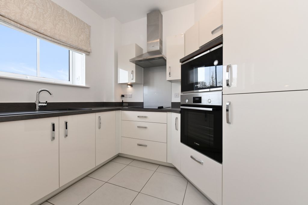 Property photo 1 of 17 A Kitchen With White Cabinets