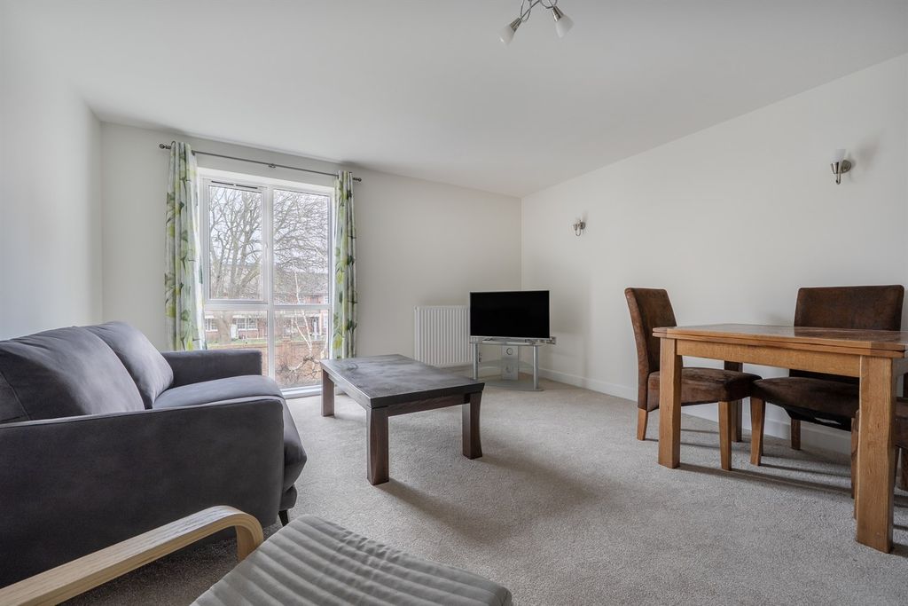 Property photo 3 of 10 Living Area