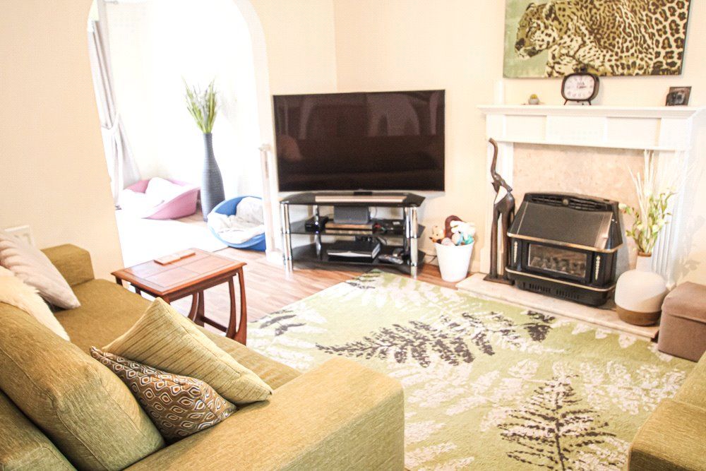 Property photo 2 of 12 Living Area