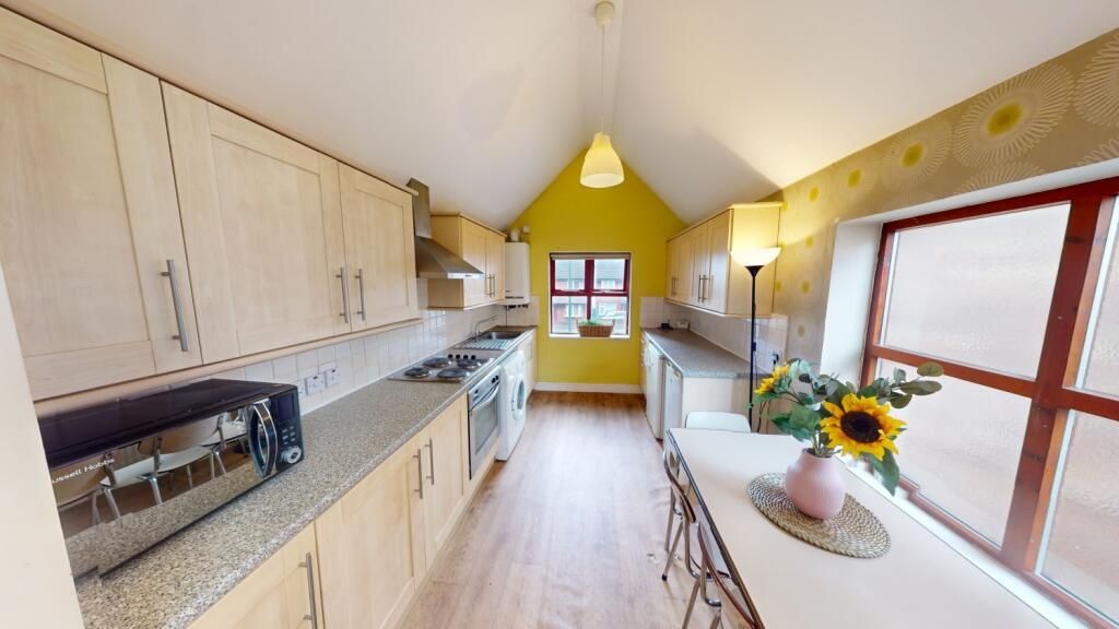Property photo 2 of 6 Bright And Modern Kitchen With Ample Natural Light...