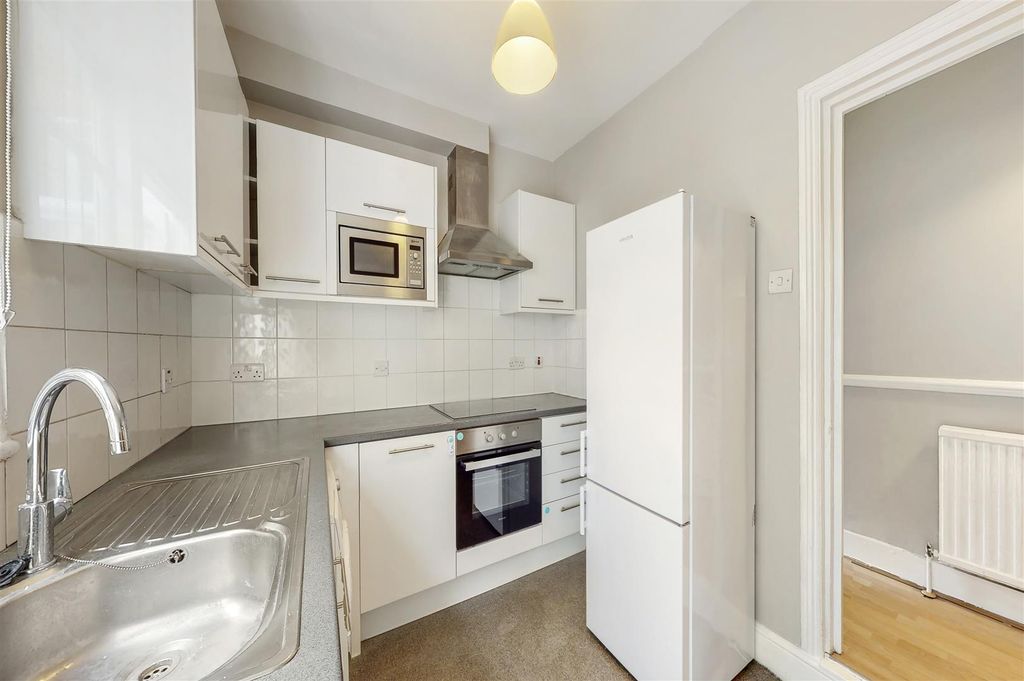 Property photo 3 of 10 Fitted White Lacquered Kitchen With Door To Garden