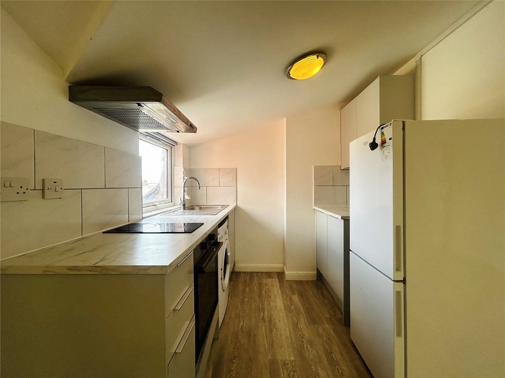 Property photo 3 of 8 Kitchen Area View