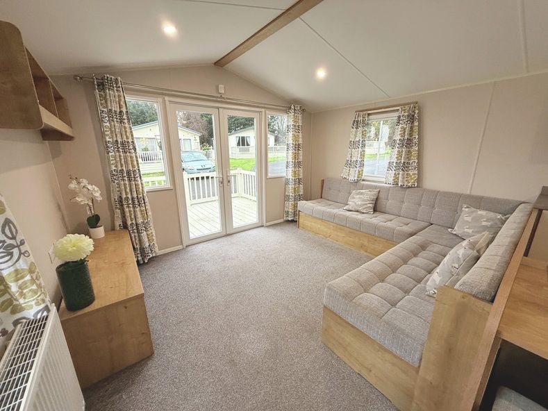 Property photo 2 of 5 Bright Lounge With L Shaped Seating And Patio Doors
