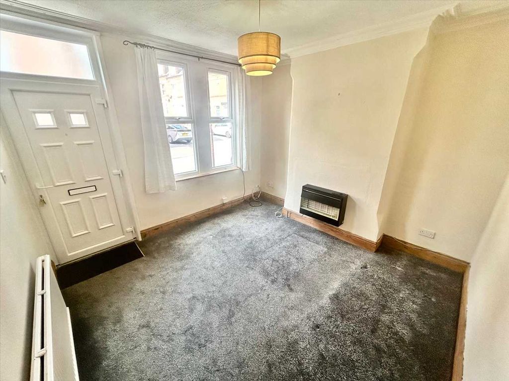Property photo 2 of 19 Front Sitting Room