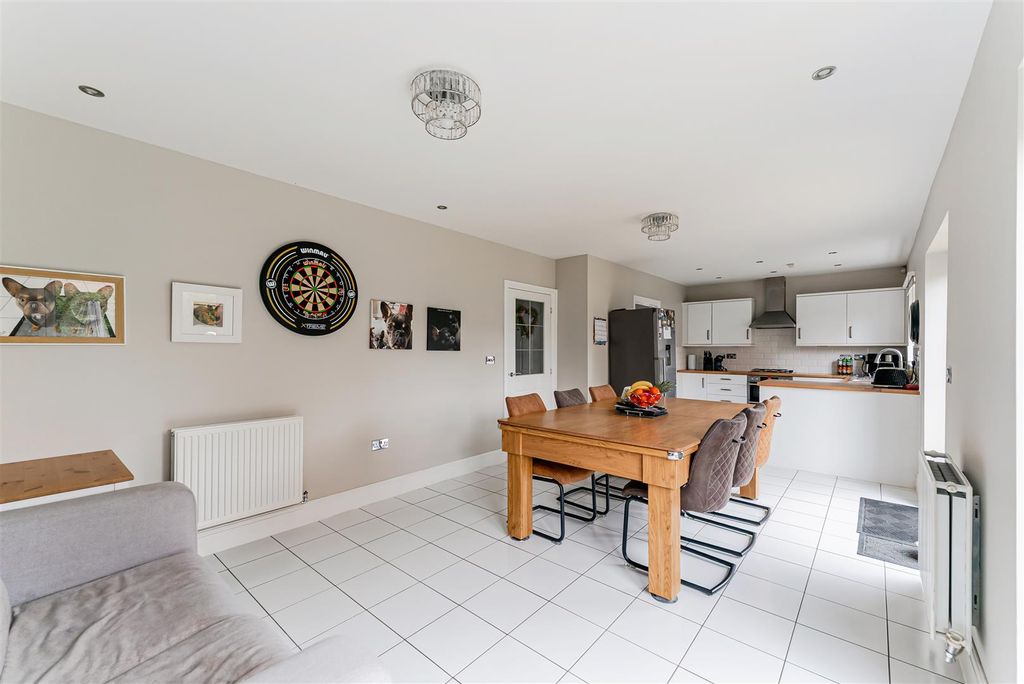 Property photo 3 of 25 Kitchen/Dining/Family