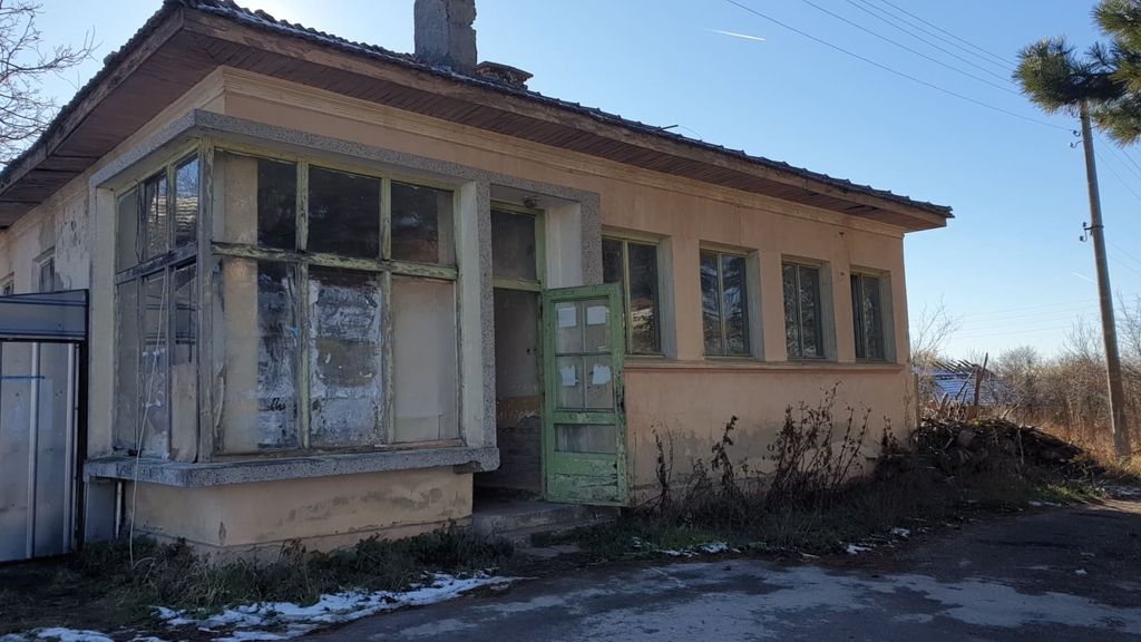Property photo 1 of 35 Exterior View Of An Old Bulgarian Bakery Building With Multiple Windows And A Green Wooden Door Open To The Outside.