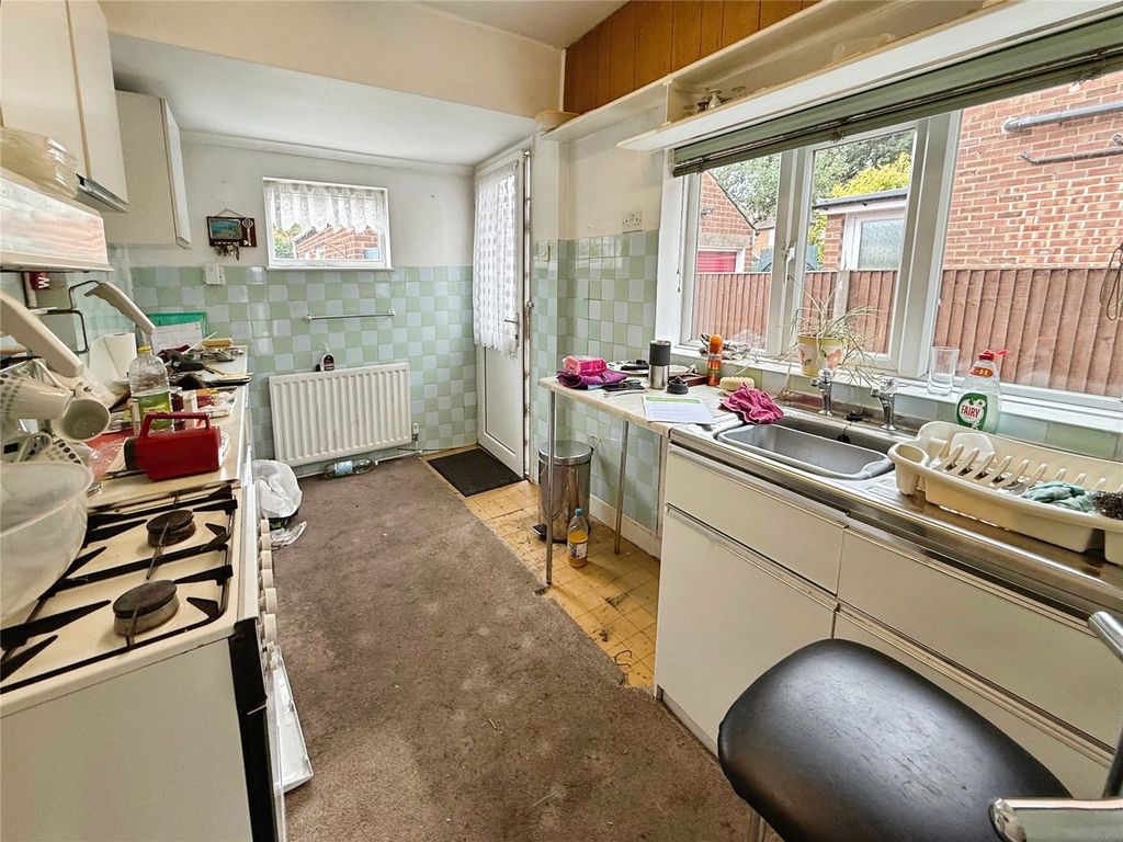 Property photo 3 of 12 Kitchen