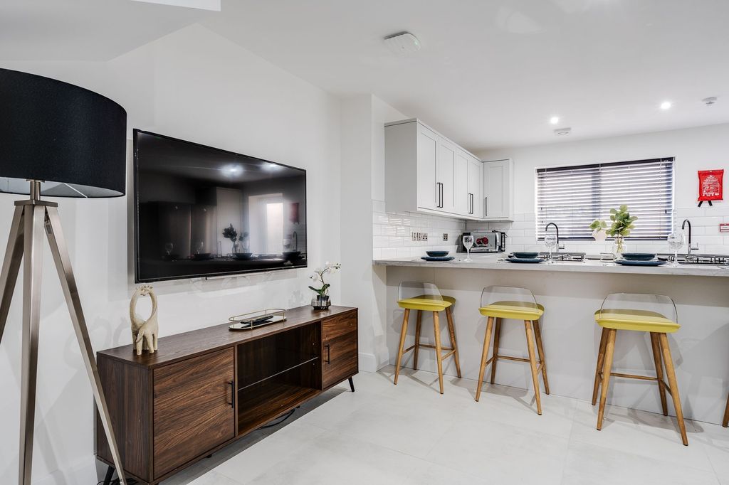 Property photo 1 of 4 Bright And Modern Kitchen With Ample Counter Space...